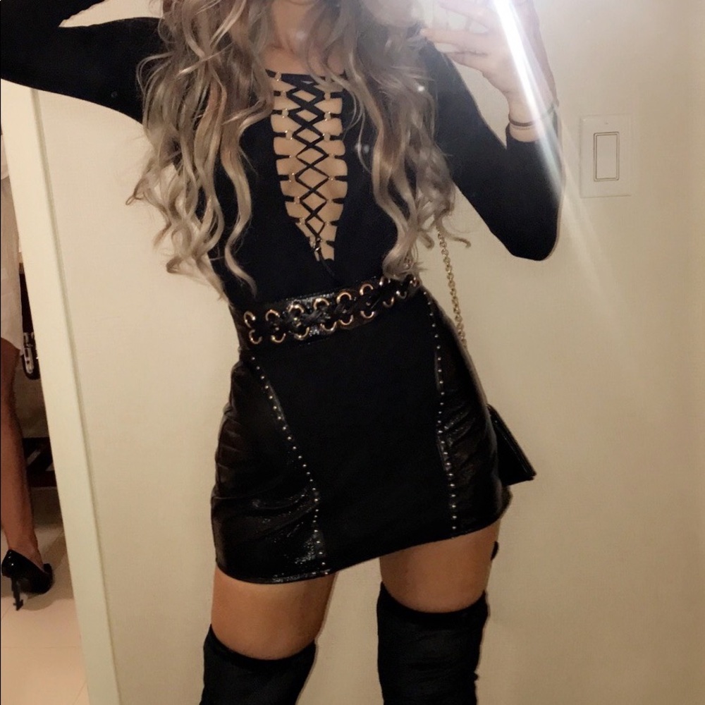 Black mini skirt with belt stud details